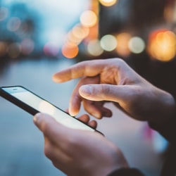 A man looking at his smartphone.